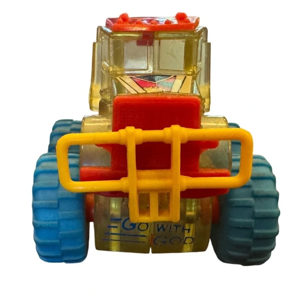 Vintage Go With God Clear Friction Monster Tractor Toy Blue Tires Visible Gears